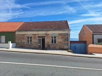 Se vende casa de piedra con vistas al mar en Ribeira