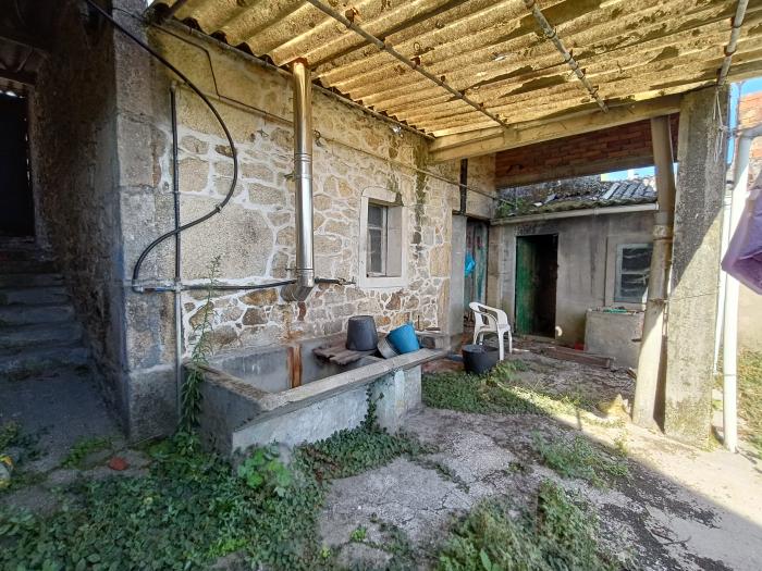 Se vende casa de piedra con vistas al mar en Ribeira